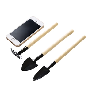 Mini 3-piece gardening tool set with wooden handles and black iron heads for bonsai