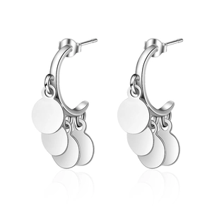 Silver C-shaped hoop earrings with polished round sequins pendants on white background