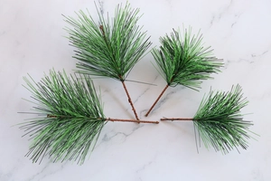 Detailed view of artificial PVC pine needles for DIY Christmas tree and home decoration