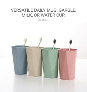 Detailed view of four hexagon-shaped matte toothbrush cups in pastel colors with props