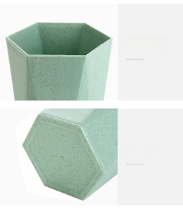 Close-up of hexagonal cup bottom showing non-slip base and eco wheat straw texture