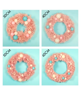Detailed comparison of pink macaron Christmas wreaths in four different size specifications