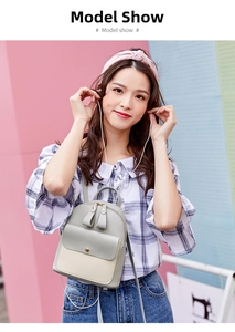 Mini multi-functional crossbody phone bag with two-tone design shown on a model