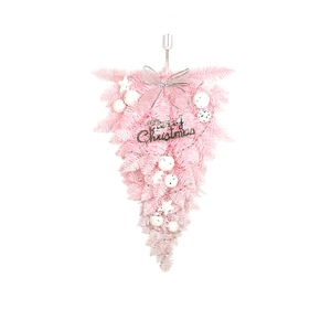 Pink inverted PVC Christmas tree hanging with white ornaments and Merry Christmas sign