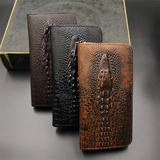 Detailed view of three classic colors of embossed crocodile pattern men's wallets