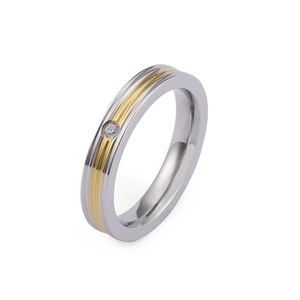 Two-tone stainless steel ring with a bezel-set round zircon shown from a 45-degree angle