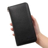 Close-up of a men's long black zipper wallet with a premium lychee texture finish