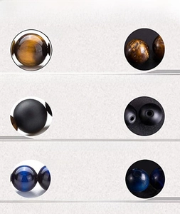 Macro detail comparing tiger eye and matte agate stone bead quality and texture