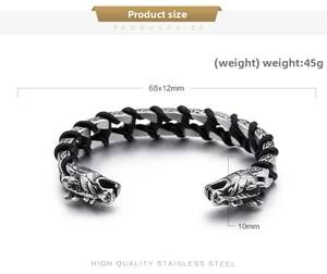 Detail of masculine stainless steel dragon head bracelet with black rope and chain textures