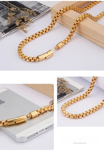 Detailed macro view of 6mm golden box chain necklace with a secure press buckle closure
