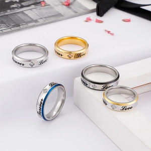 Five Forever Love engraved stainless steel rings with zircon stones in various colors