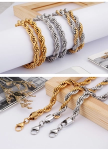 Close-up of twisted rope chains in gold and silver colors with secure lobster clasps