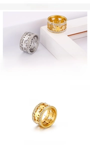 Detail showing 12mm stainless steel hollow elephant rings with zircon stones in gold and silver