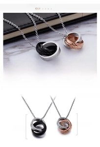 Detailed view of interlocking double ring pendant necklaces with zircon inlay and sizes