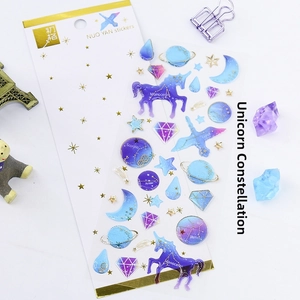 Detailed view of unicorn and constellation PET stickers with gold stamping finish