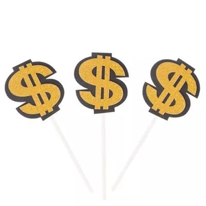 Gros plan de décorations de gâteau signe dollar à paillettes dorées pour fête riche