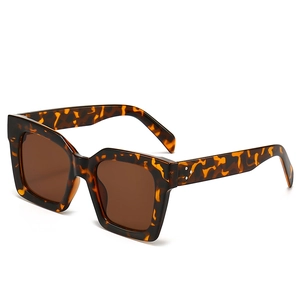 Retro tortoise shell square sunglasses with thick frames and three metal rivets detail