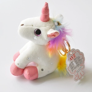 Detail of 12cm plush unicorn keychain with rainbow hair and pink glitter accents