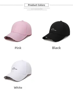 Detail of Grace embroidery on classic cotton baseball caps in pink, black, and white