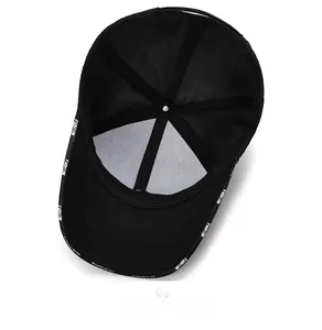 Close-up of black baseball cap interior showing mesh fabric and FASHION logo sweatband