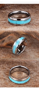 Detail view of silver tungsten ring with inlaid turquoise band and hammered edges