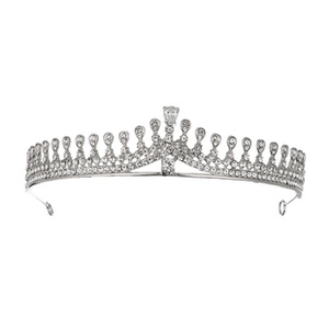 Detailed close-up of a silver bridal tiara with sparkling crystal teardrop accents