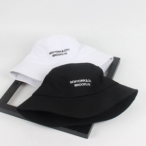 Detailed embroidery of NEWYORK CITY BROOKLYN on black and white cotton bucket hats