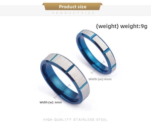 Detail of blue and silver grooved stainless steel couple rings in 4mm and 6mm widths