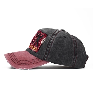 Washed cotton baseball cap with distressed brim and vintage contrast color patchwork