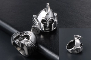 Detailed multi-angle view of a silver Spartan helmet skull ring made of titanium steel