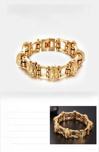 Detailed close-up of 316L titanium steel bike chain bracelet with gold Buddha head