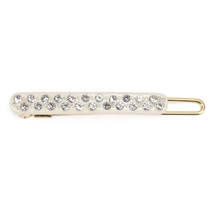 Detail of elegant gold-toned hairpin with white resin and two rows of sparkling rhinestones