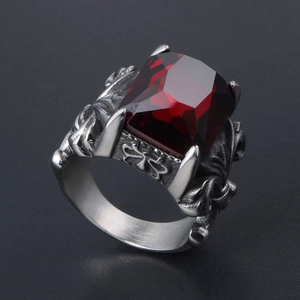 Vintage steel signet ring with red rectangular stone and baroque engraved details