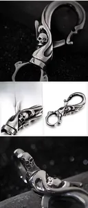 Macro shot of 316L stainless steel lobster clasp with punk skull charm and material mark