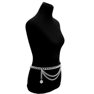 Detail of silver multi-layer body chain with Cuban links and coin pendant on a mannequin