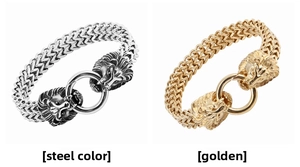 Detail view of woven steel chain bracelet featuring dual lion heads and ring clasp