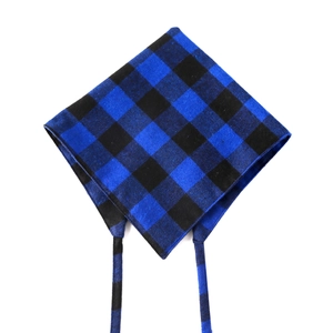Detailed close-up of blue and black buffalo check cotton dog bandana with secure neck ties