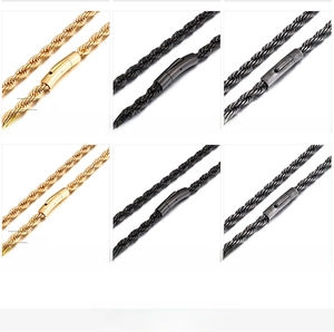 Detail view of various sizes and colors of metallic rope chains with secure clasps