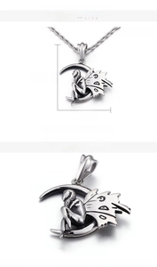 Detail view of crescent moon fairy pendant in stainless steel showing 50mm height and 40mm width