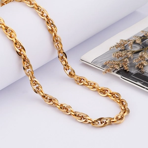 Polished gold stainless steel braided chain necklace for men on minimalist white background