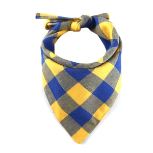 Detailed view of yellow and blue plaid cotton pet bandana with tie-on knot design