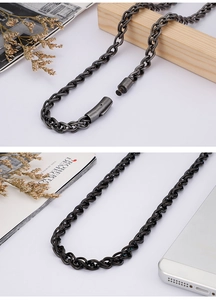 Detail of grey stainless steel rope chain necklace featuring a cylindrical barrel clasp