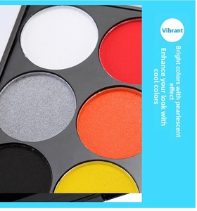 Close-up of 15-color body paint palette with matte and pearlescent textures