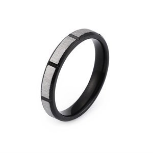 Minimalist black stainless steel ring with brushed silver accents for couples