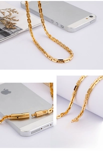 Detail view of 304 stainless steel gold rectangular link chain with secure plug-in clasp