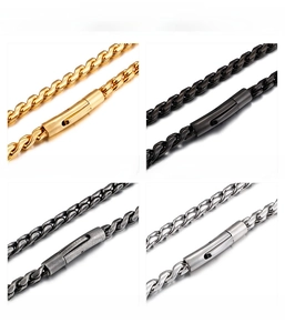 Detail of stainless steel dragon bone chains in golden, black, gray and silver finishes