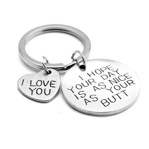 Stainless steel keychain set with heart and round tags featuring romantic engravings