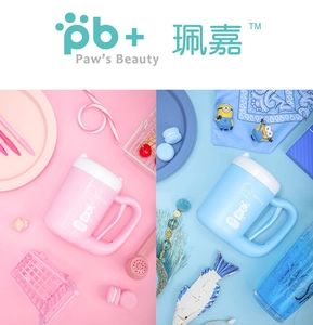 Detail of pink and blue portable pet paw cleaners with cartoon dog prints and handles