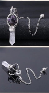 Macro view of rotating Merkaba star crystal pendant with detailed silver metal chain