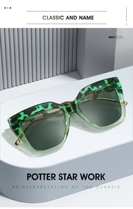 Detailed shot of green tortoise shell oversized sunglasses with sleek gold metal temples